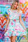 Under Your Spell Floral Smocked Flutter Sleeve Ruffle Mini Dress